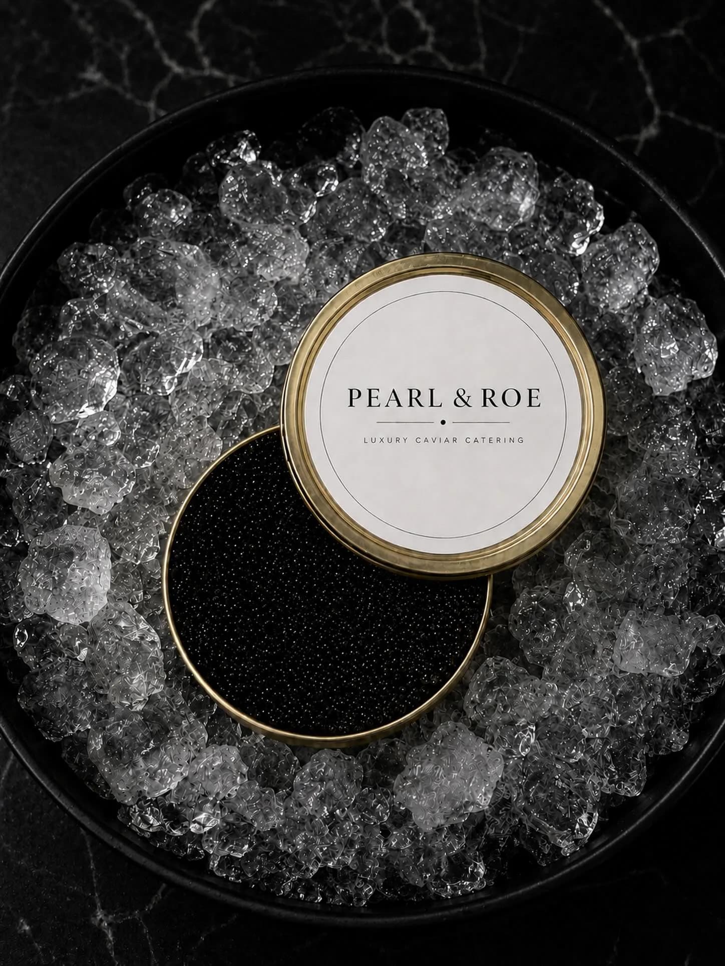 An open tin of Pearl & Roe caviar resting on crushed ice